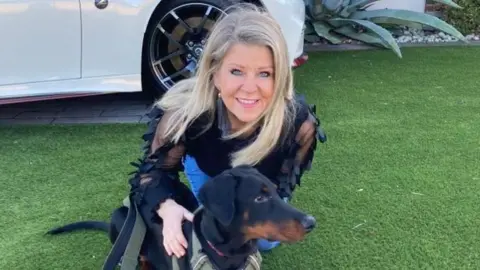 Leigh Best Leigh Best with a dog