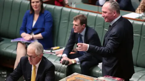 Getty Images Malcolm Turnbull (L) and Barnaby Joyce (R) in parliament