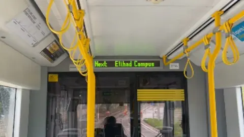 Liam Gallagher is taking over Manchester's tram network by voicing passenger announcements.