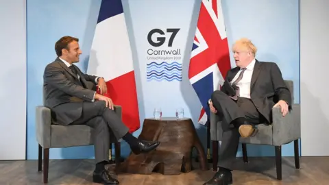 PA Media President Emmanuel Macron and Boris Johnson