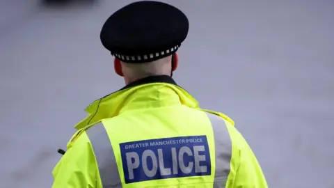 PA Media A generic image of a GMP policeman