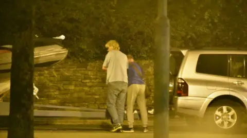 NCA Men, boat and car