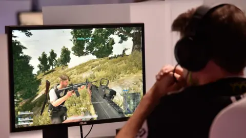 Getty Images A gamer plays 'PlayerUnknown's Battlegrounds' while competing at an esports tournament