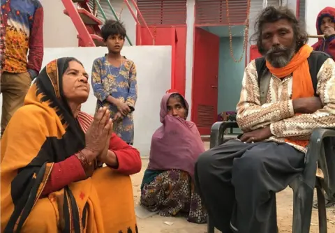 Sashi Devi (sitting on the left) and Asharfi Nath (right)