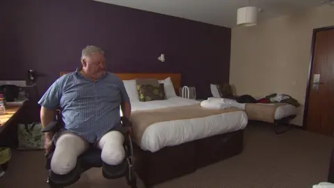 BBC Tom Adams in hotel room