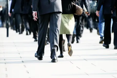 Getty Images Street scene, commuters walking