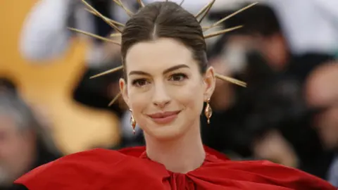 Reuters Actress Anne Hathaway arrives at the Metropolitan Museum of Art Costume Institute Gala (Met Gala) to celebrate the opening of â€œHeavenly Bodies: Fashion and the Catholic Imaginationâ€ in the Manhattan borough of New York, U.S., May 7, 2018