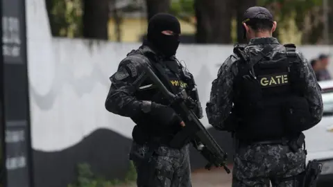 Reuters Policemen are seen at the Raul Brasil school after a shooting in Suzano