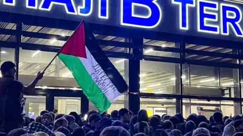 RAMAZAN RASHIDOV/TASS Mob storming airport in Dagestan, Russia