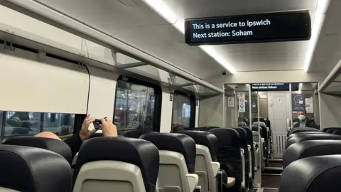 Inside a train carriage on the Ipswich-Peterborough line