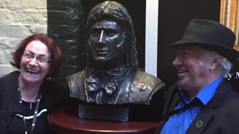Courtesy of Michael O'Flangan Carmel McCartney Dublin City Council official and Michael O'Flanagan Secretary The Kilmainham and Inchicore Heritage Group stand beside a bust of Henry Joy McCracken