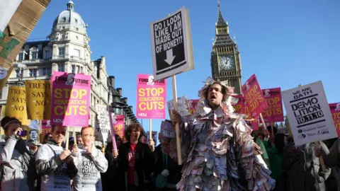 PA Media Students and teachers gather in central London to protest against university funding cuts