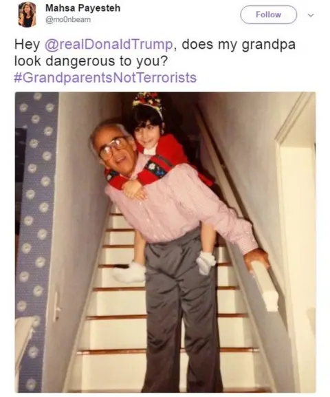 @mo0nbeam Mahsa Payesteh tweets a photo of her as a child on her grandfather's back with the caption: "Hey @realDonaldTrump, does my grandpa look dangerous to you? #GrandparentsNotTerrorists".