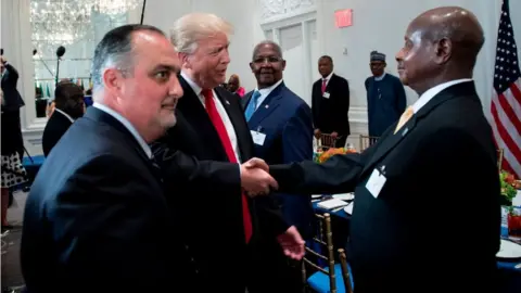 AFP US President Donald Trump (C) greets Uganda's President Yowri Kaguta Museveni (R) before a luncheon with US and African leaders at the Palace Hotel during the 72nd United Nations General Assembly on September 20, 2017