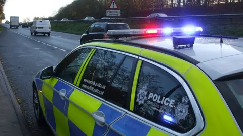 A police car on the A14