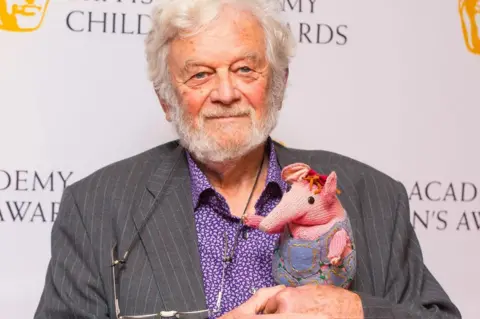 Dominic Lipinski/PA Wire Firmin and clanger at Bafta