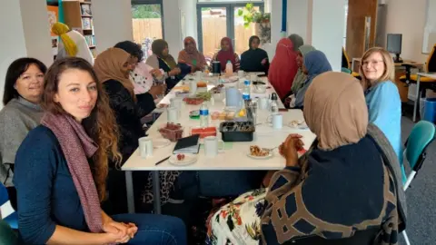 Women attending the coffee mornings