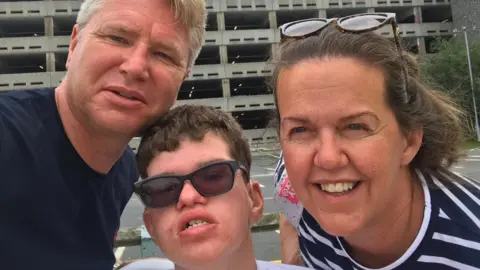 Fraser with dad Andrew and mother Karen