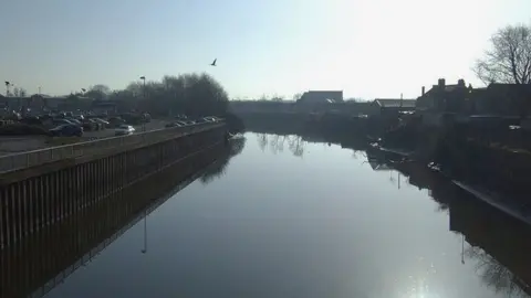 J THomas/Geograph River Mersey close to Wharf Street in Warrington