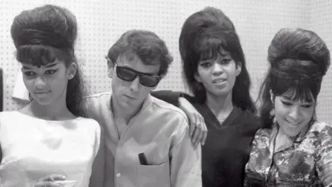 Getty Images Phil Spector with the Ronettes