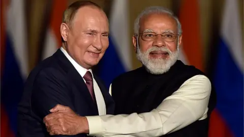 Getty Images Prime Minister Narendra Modi with Russian President Vladimir Putin prior to their delegation meeting at Hyderabad House, on December 6, 2021 in New Delhi, India