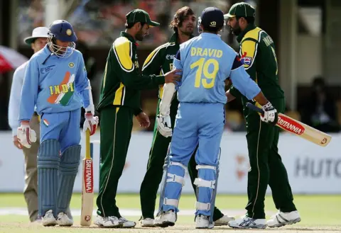 Getty Images Shoaib Akhtar and Rahul Dravid face off at the 2004 Champions Trophy,