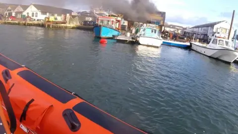 RNLI/Poole Fire in Arthur Bray Yard, West Quay Road