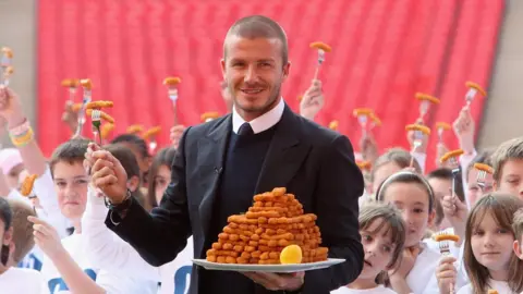 Getty Images Beckham with a plate of fish fingers