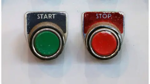 Reuters The start and stop buttons in the main turbine hall of Hinkley B