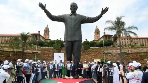 Deaan Vivier/Getty Images The wreath laying at the stature of Nelson Mandela during a Pro-Palestine demonstration at the Union Buildings on December 05, 2023 in Pretoria, South Africa. The march also commemorated the 10th anniversary of Nelson Mandela's death.