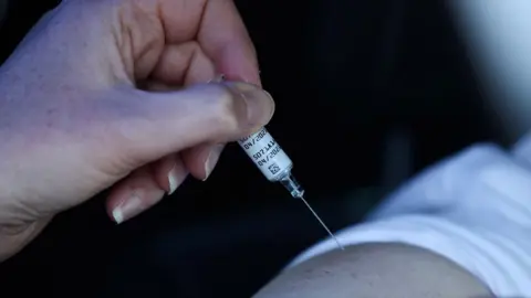 Reuters Flu vaccination
