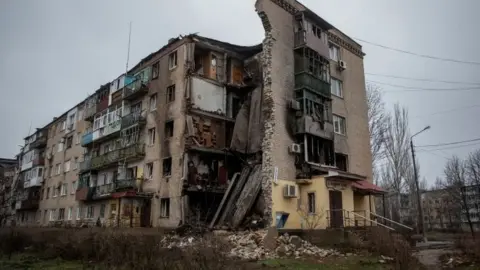 Reuters Damaged residential building in Bakhmut - 18 December