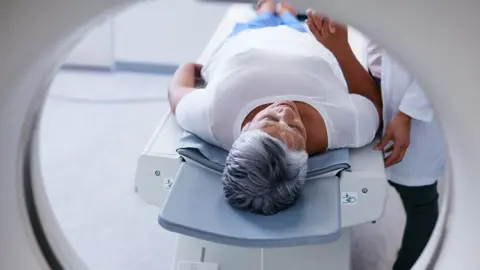 Getty Images woman going through MRI machine