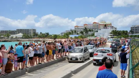 Gabriele Fontana Image of people watching planes take off in Sint Maarten, taken at Maho Beach