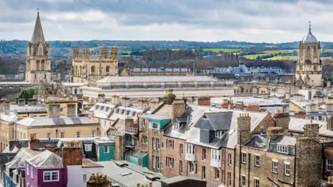 Anthony P Morris View to Christ Church over the roof tops of Oxford