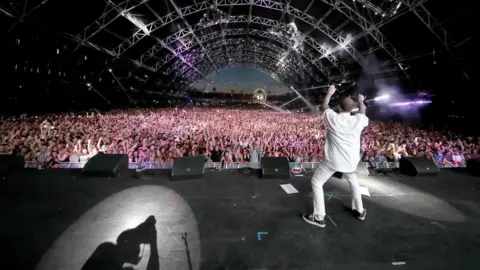 Getty Images Mac Miller on stage