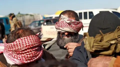 Getty Images Blindfolded IS fighters