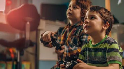 Getty Images Children playing computer games