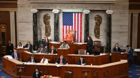 Getty Images House Clerk Cheryl Johnson presides as voting continues for new speaker at the US Capitol in Washington, DC, on January 5, 2023