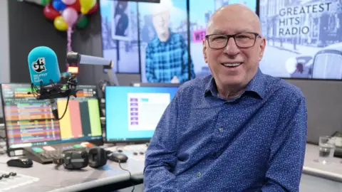 PA Media File photo dated 29/03/23 of radio presenter Ken Bruce in the Greatest Hits Radio studio