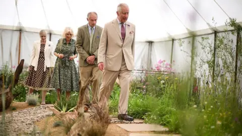 PA Media The Royal couple visit a dry garden at the show