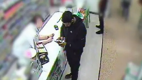 Nectu Munir Mohammed in Asda buying chemicals