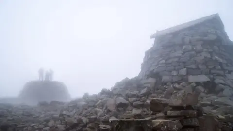 Getty Images Cairn and trig point