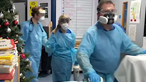 Morriston Hospital staff in Swansea wearing full PPE on Covid ward