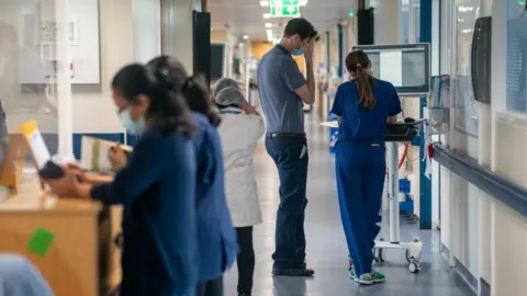 PA Media Medical staff on hospital ward