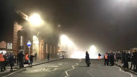 Press Eye People watch outside Nottingham railway station