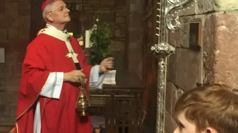 Archbishop and censer