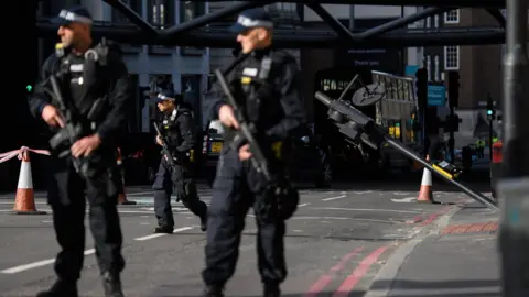 Getty Images Armed police at scene of attack