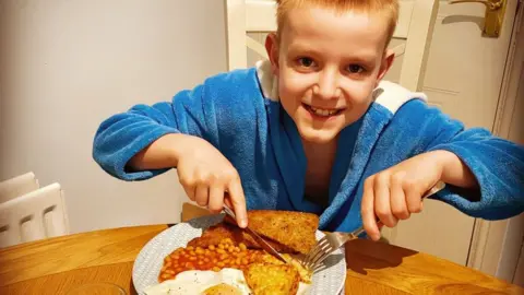 Ian Stimson  Finley Stimson eating breakfast