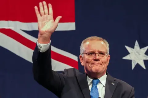 Getty Images Prime Minister Scott Morrison concedes defeat following the results of the Federal Election during the Liberal Party election night event at the Fullerton Hotel on May 21, 2022 in Sydney,